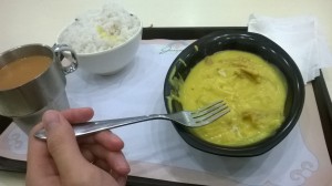 The bowl of curry is actually ovoid. Yay optical illusions!