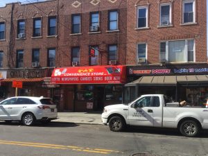 Bodega next to a Dunkin Donuts/Baskin Robbins chain in Astoria